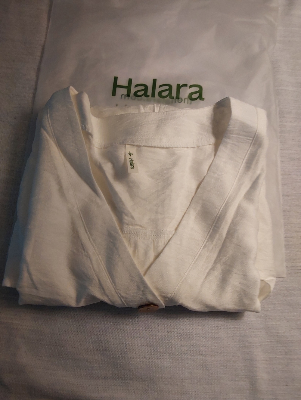 HALARA Cream Sleeveless Henley Tank with Wood Buttons - Picture 3 of 3